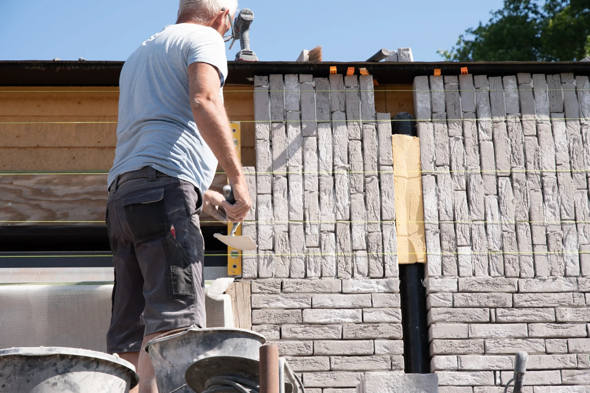 masonry-worker-the-bricklayer-makes-the-facade-of-2025-03-11-15-32-10-utc_compressed