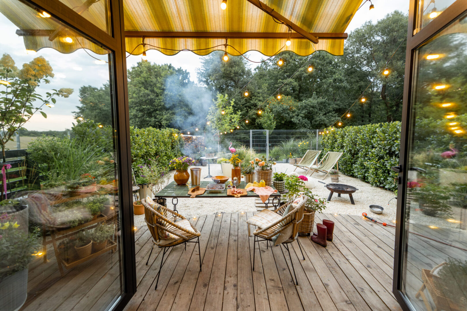 Garden table set with vases and plates