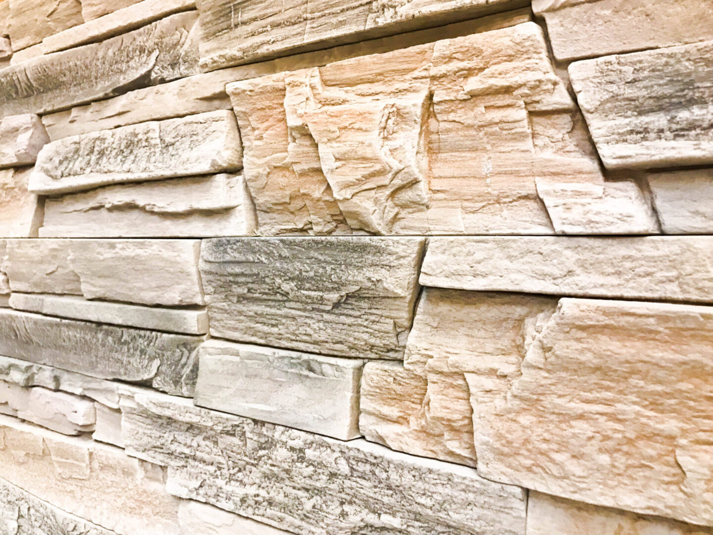 vecteezy_beautiful-texture-of-a-decorative-stone-wall-at-an-angle-of_13871245