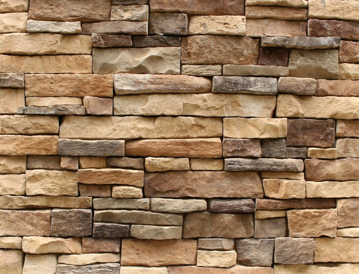 vecteezy_brown-stone-wall-background_1916295